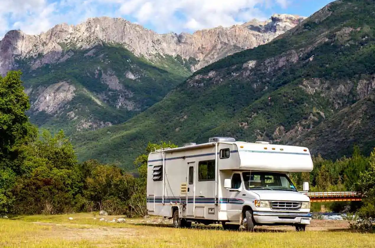 Class C RV parked in outdoors