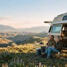A couple RVing in the wilderness
