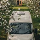 Class B RV in the spring bloom of an apple orchard